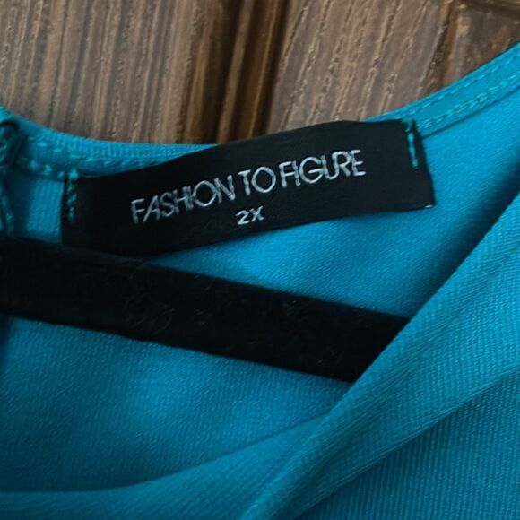 Sleek Teal Peplum Dress with Gold Detail - Picture 4 of 7